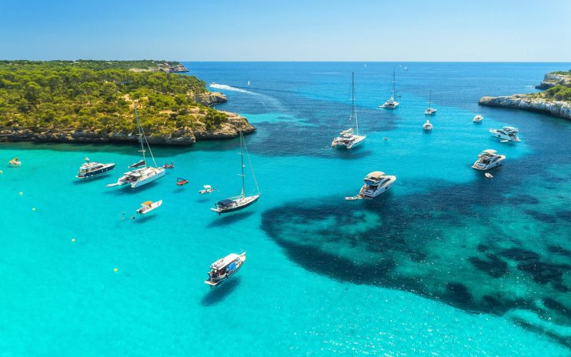 aerial-view-of-boats-luxury-yachts-on-the-sea-in-sunny-day-1.jpg